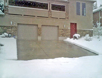 Radiant heated concrete driveway.