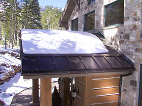 Roof heating panels installed to heat roof edges.